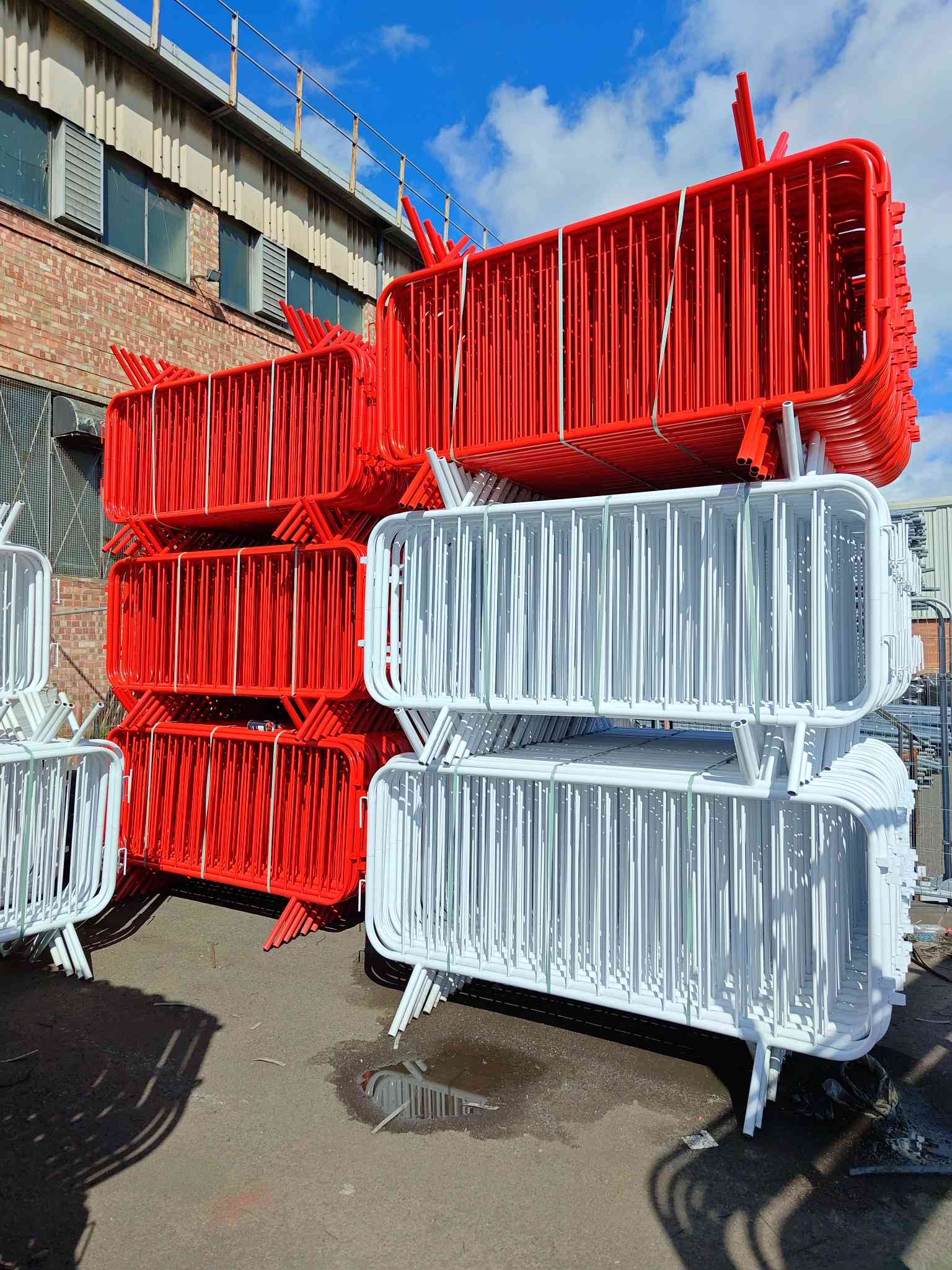 Powder-coated red and white crowd control barriers — Tempfence UK
